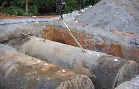 Photograph of leaking fuel and chemical storage tanks